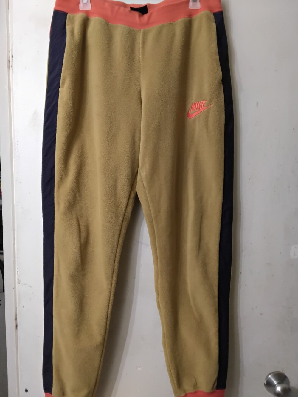 Nike Men's Tan Joggers with Navy Side Panels and Coral Accents